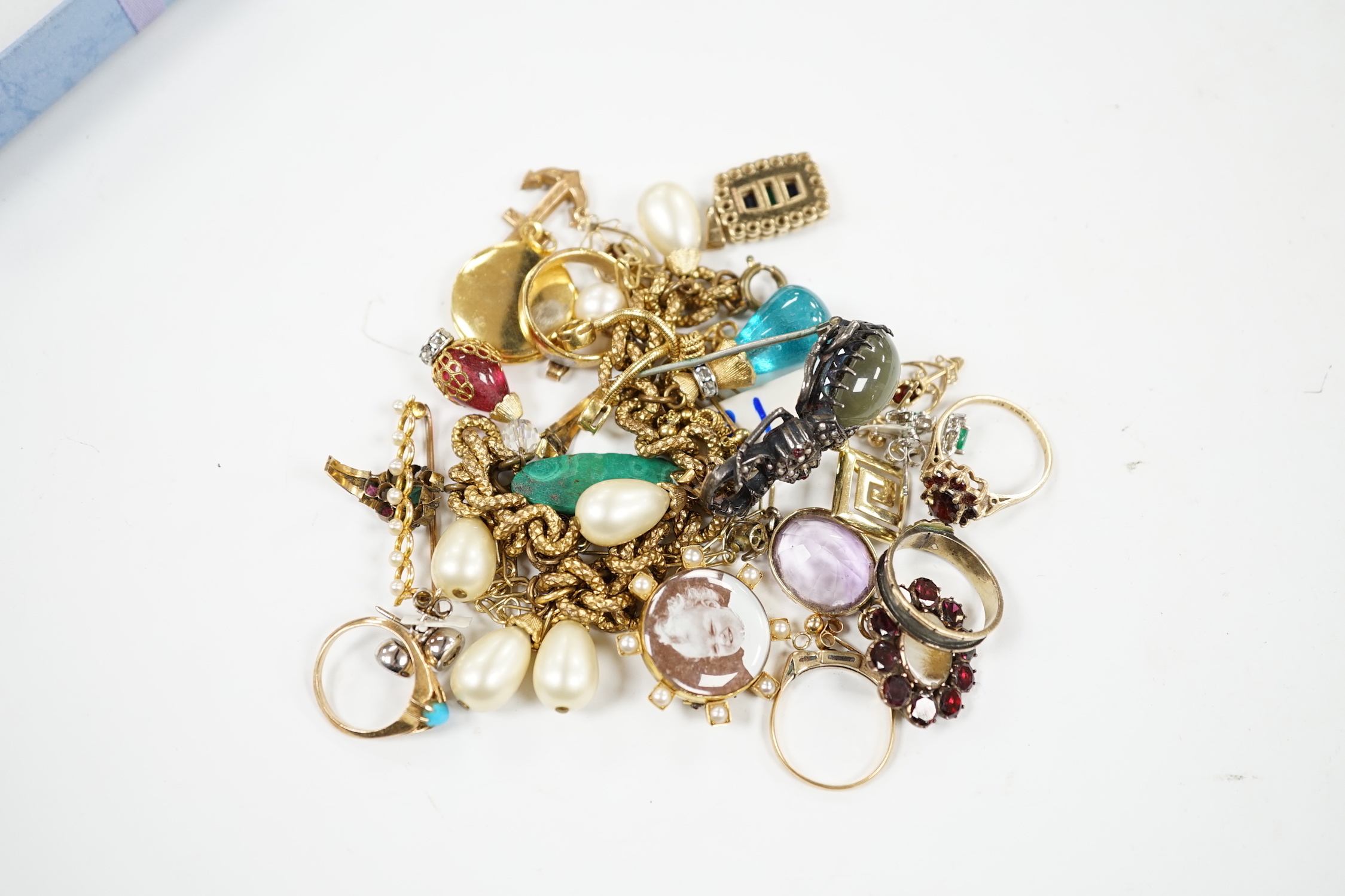 Assorted jewellery including a 9ct anchor charm, yellow metal, opal and diamond set ring, 9ct and garnet cluster ring, mourning ring, 9ct, emerald, sapphire and diamond set pendant, pair of 750 white metal and single sto